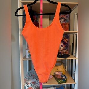 Body -Orange One-Piece Swimsuit NWT size medium